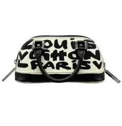 Louis Vuitton Alma Graffiti Leather Handbag